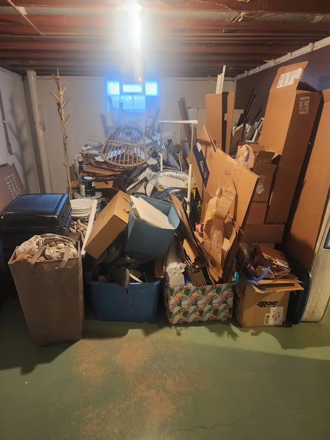 Roll-off dumpster container at job site for Construction Dumpster Rental in Fort McKinley